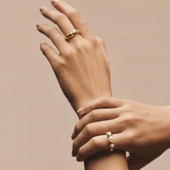 SWIRL W. PEARL RING